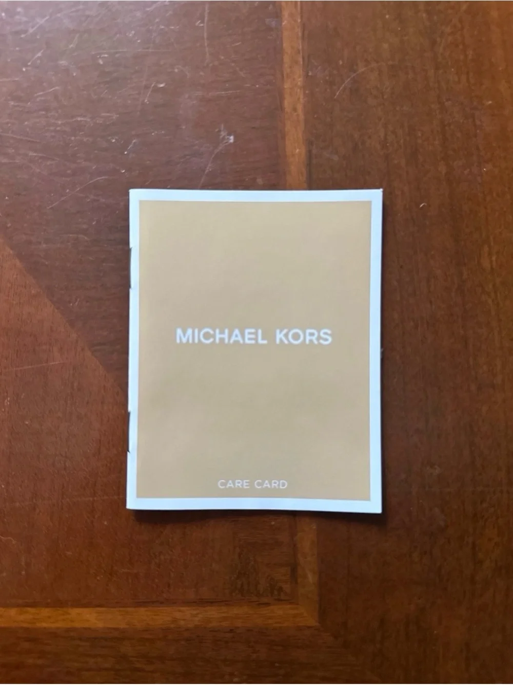Michael Kors Brown and Gray MK Logo Tote with Tassel Charm